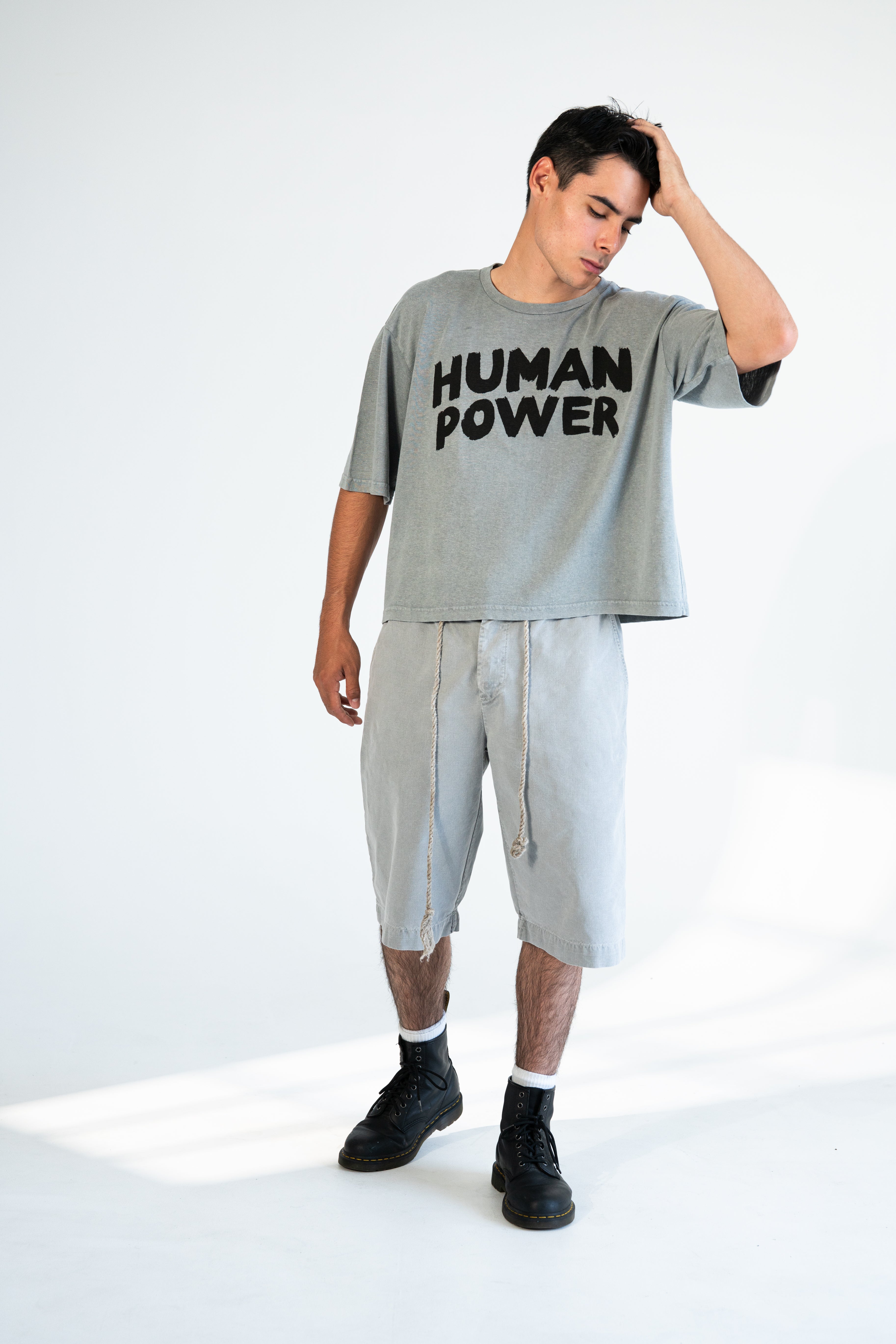 Model wearing Classic Muslin Hemp Shorts in Coconut Charcoal, handcrafted in Los Angeles from hemp and organic cotton.