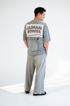 Hand-applied white paint and distressed finish on charcoal hemp fleece