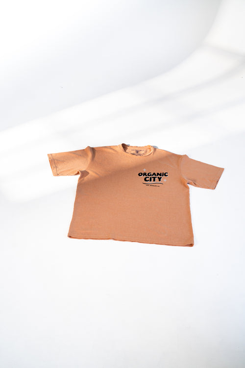Organic City artwork on the Malibu Tee, screen printed with water-based ink